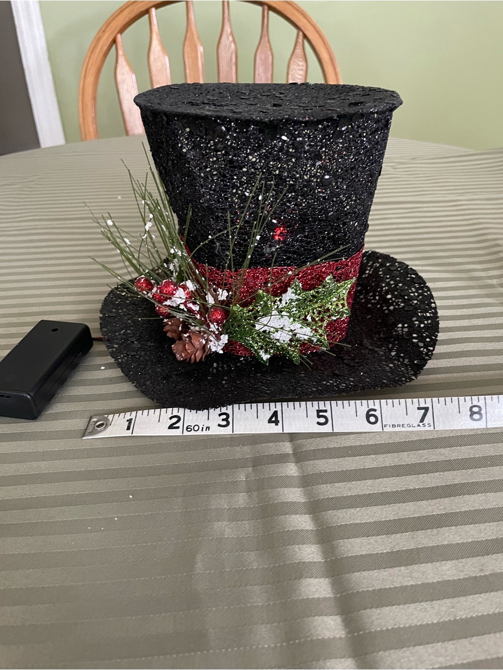 Glittery Black Mini Top Hat with Red Band and Holiday Sprig